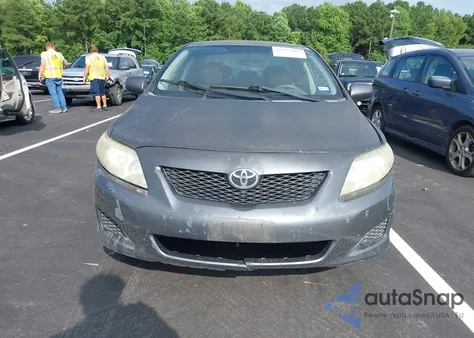 2009 Toyota Corolla Le из США, поврежденный, VIN 1NXBU40E69Z117938